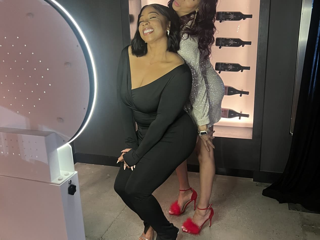 Guests posing at the photo booth